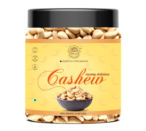 Premium whole raw cashews in wooden bowl