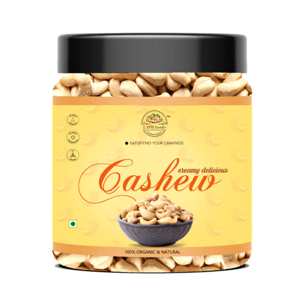 Premium whole raw cashews in wooden bowl